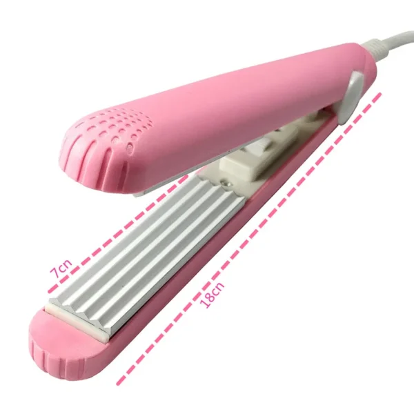 Un mini fer à cheveux plaque ondulée rose fer à friser électrique outils de modélisation de boucles