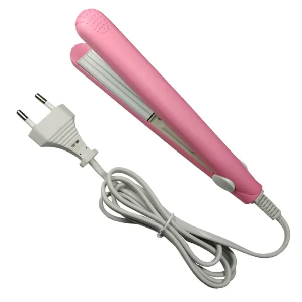 Un mini fer à cheveux plaque ondulée rose fer à friser électrique outils de modélisation de boucles